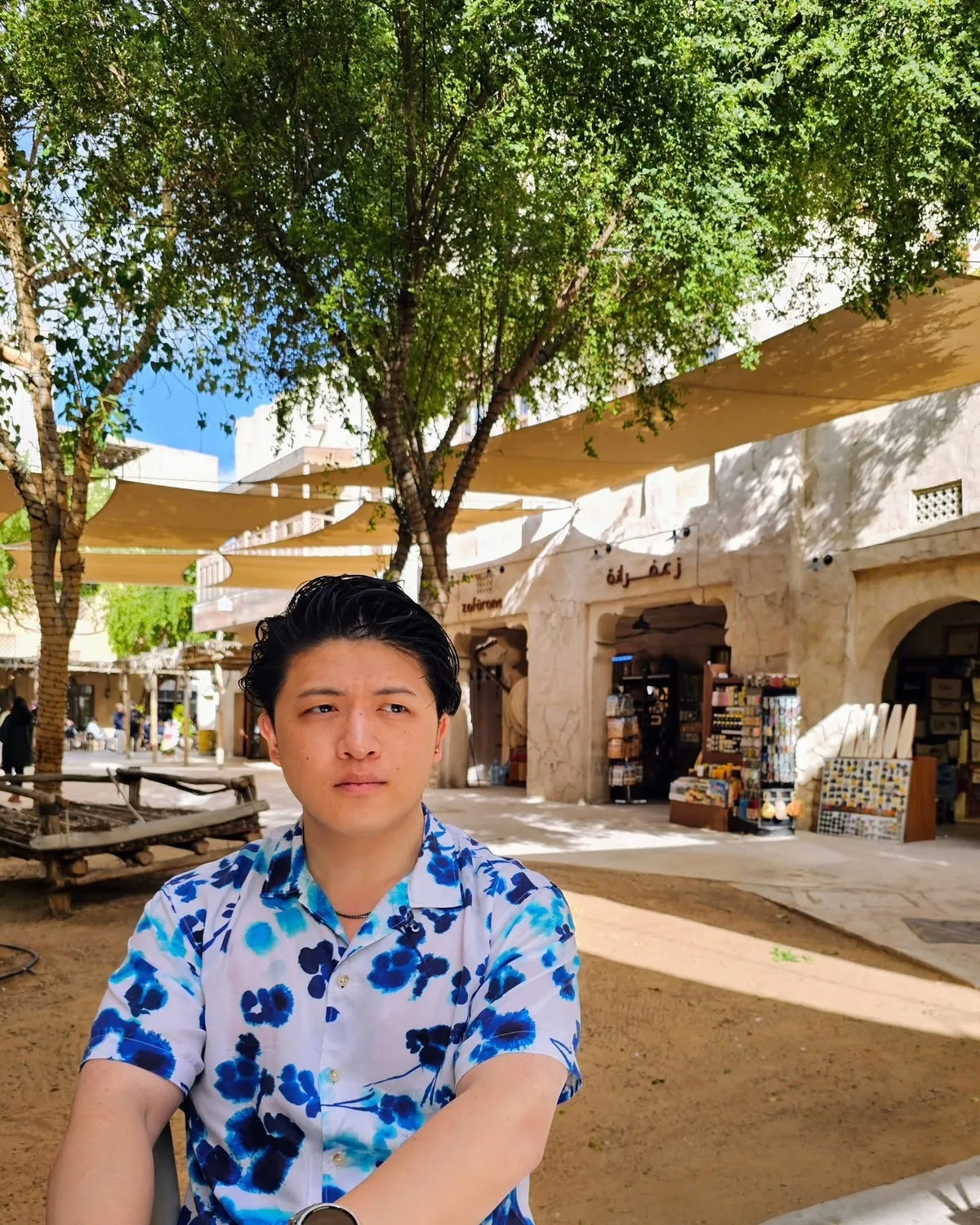 Aaron Huang smiling outdoors
